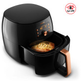 سرخ کن بدون روغن فیلیپس مدل 9867 که بسکت آن به صورت کشویی و تا نیمه خارج شده است.