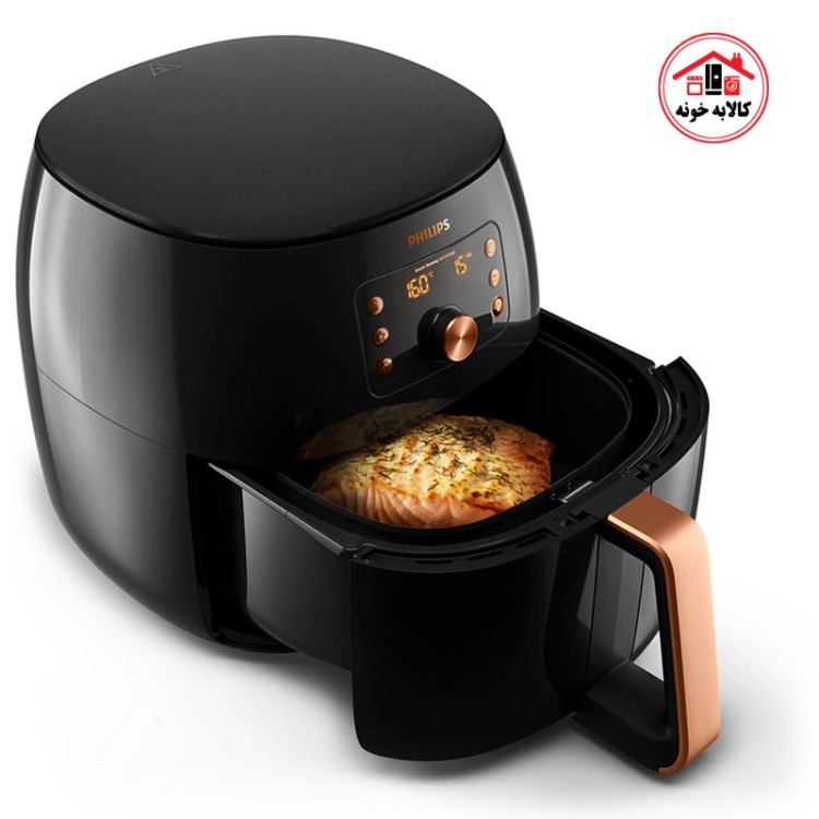 سرخ کن بدون روغن فیلیپس مدل 9867 که بسکت آن به صورت کشویی و تا نیمه خارج شده است.